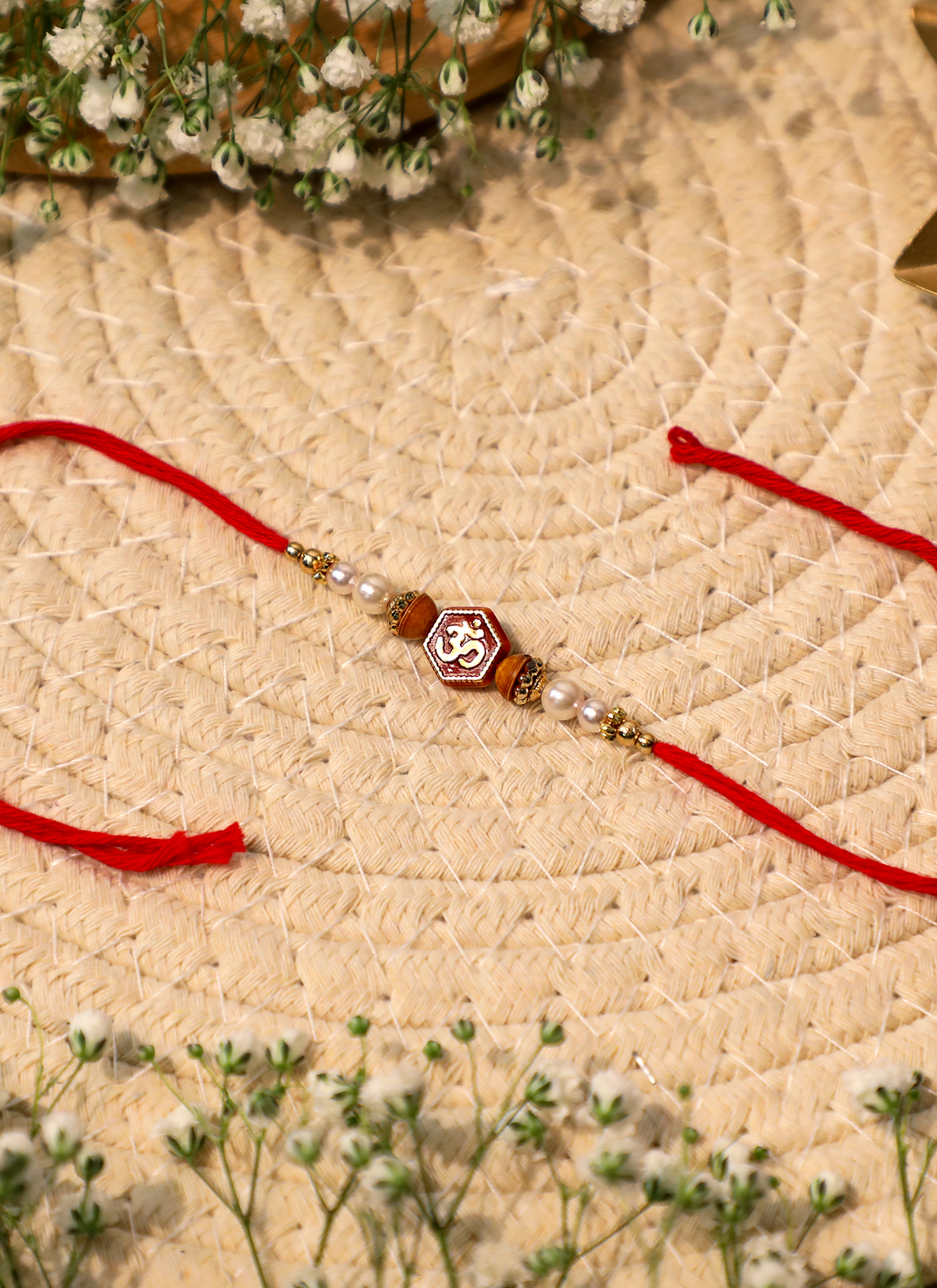 Madhoor Om Rakhi Red Ivory 1 Piece