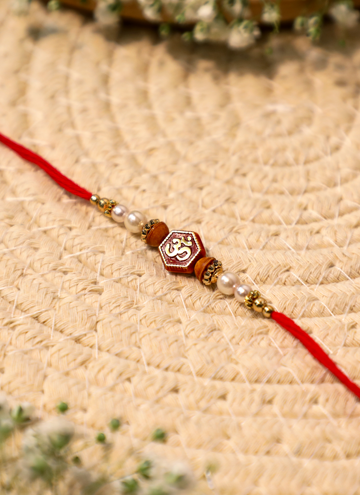 Madhoor Om Rakhi Red Ivory 1 Piece