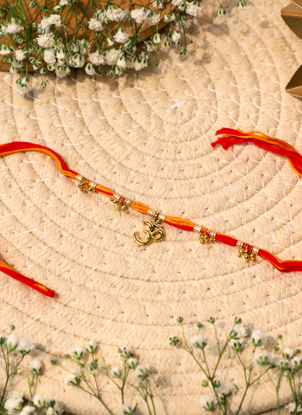 Madhoor Om Rakhi Red Yellow 1 Piece