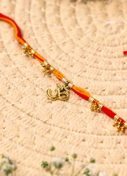 Madhoor Om Rakhi Red Yellow 1 Piece