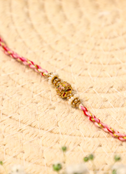 Madhoor Meenakari Rakhi Teal Cream Gold-Tone 1 Piece