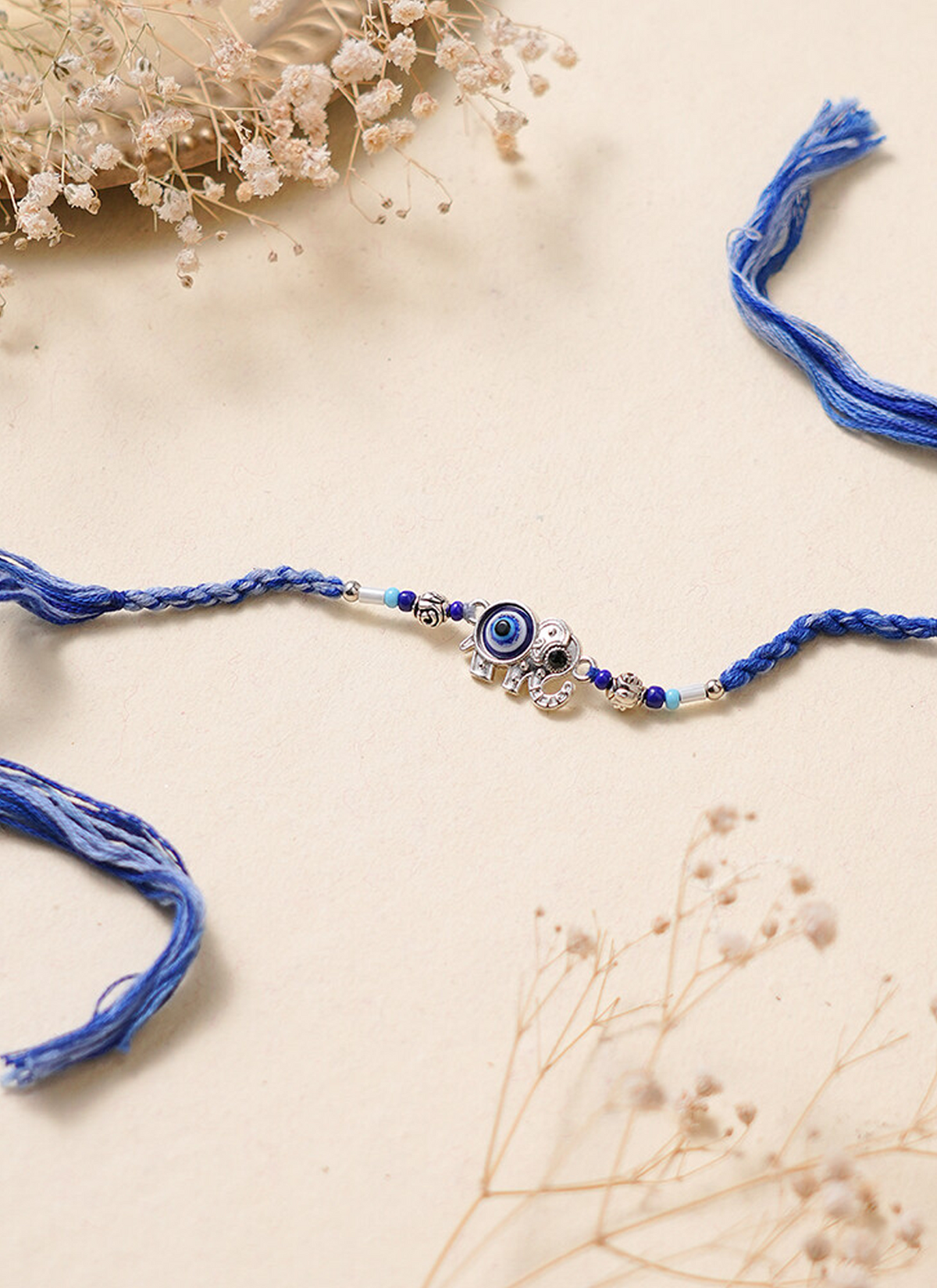 Madhoor Evil Eye Rakhi Blue 1 Piece