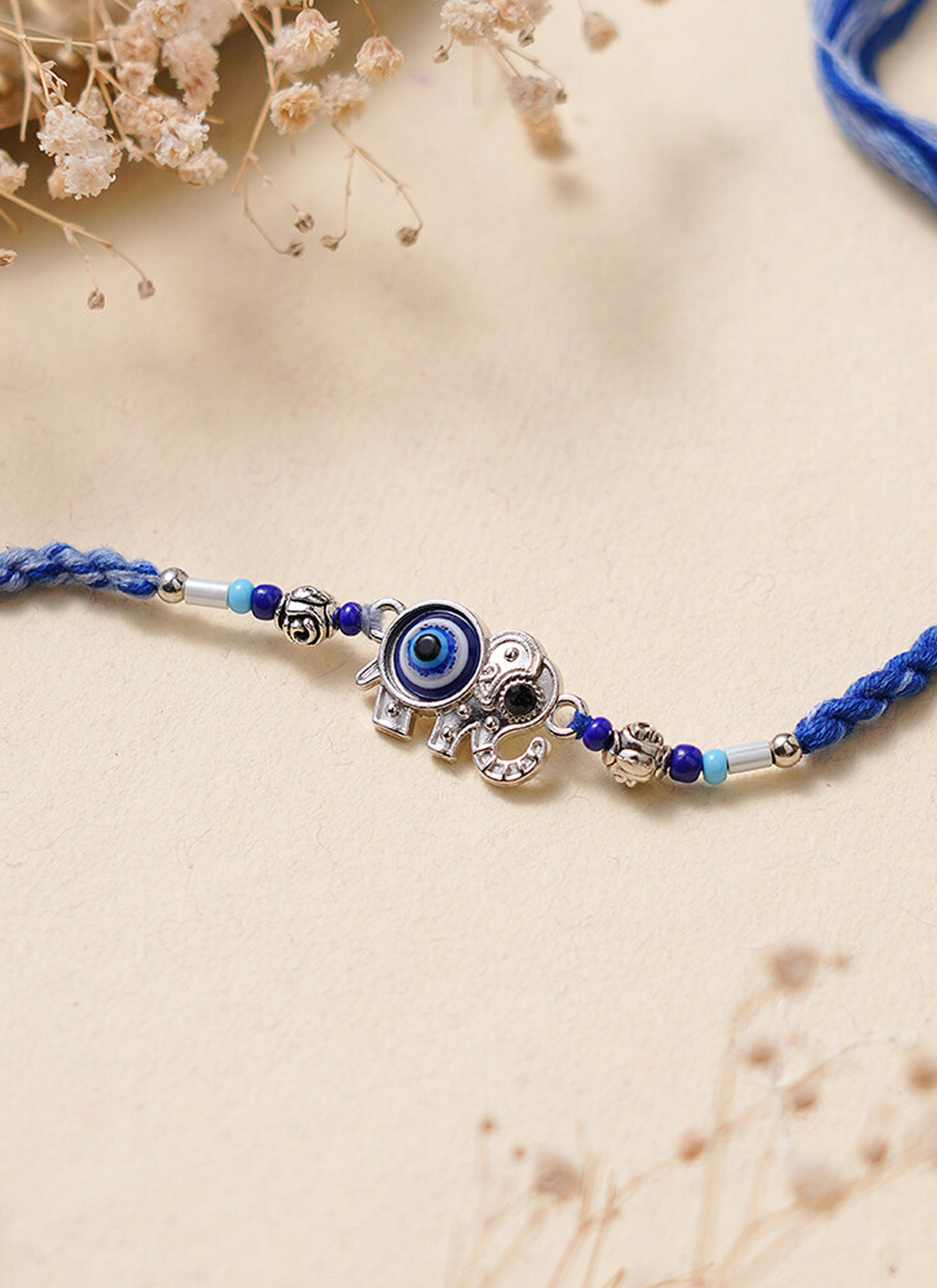 Madhoor Evil Eye Rakhi Blue 1 Piece