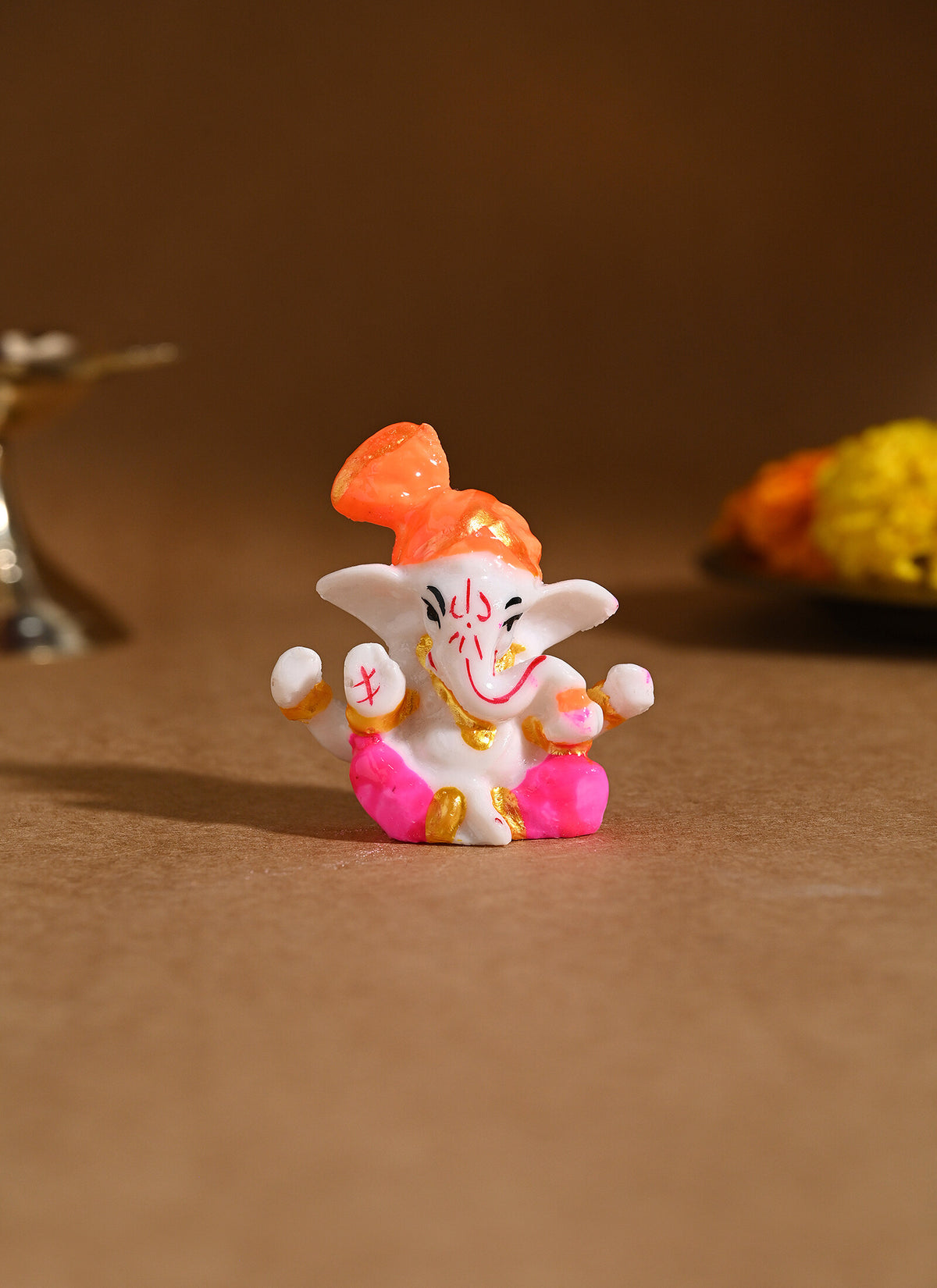 Madhoor Ganesha Deity Idol Yellow Orange 1 Piece
