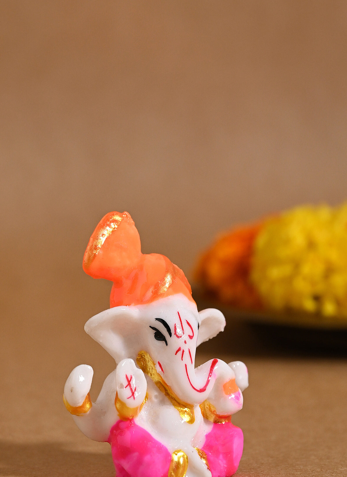 Madhoor Ganesha Deity Idol Yellow Orange 1 Piece