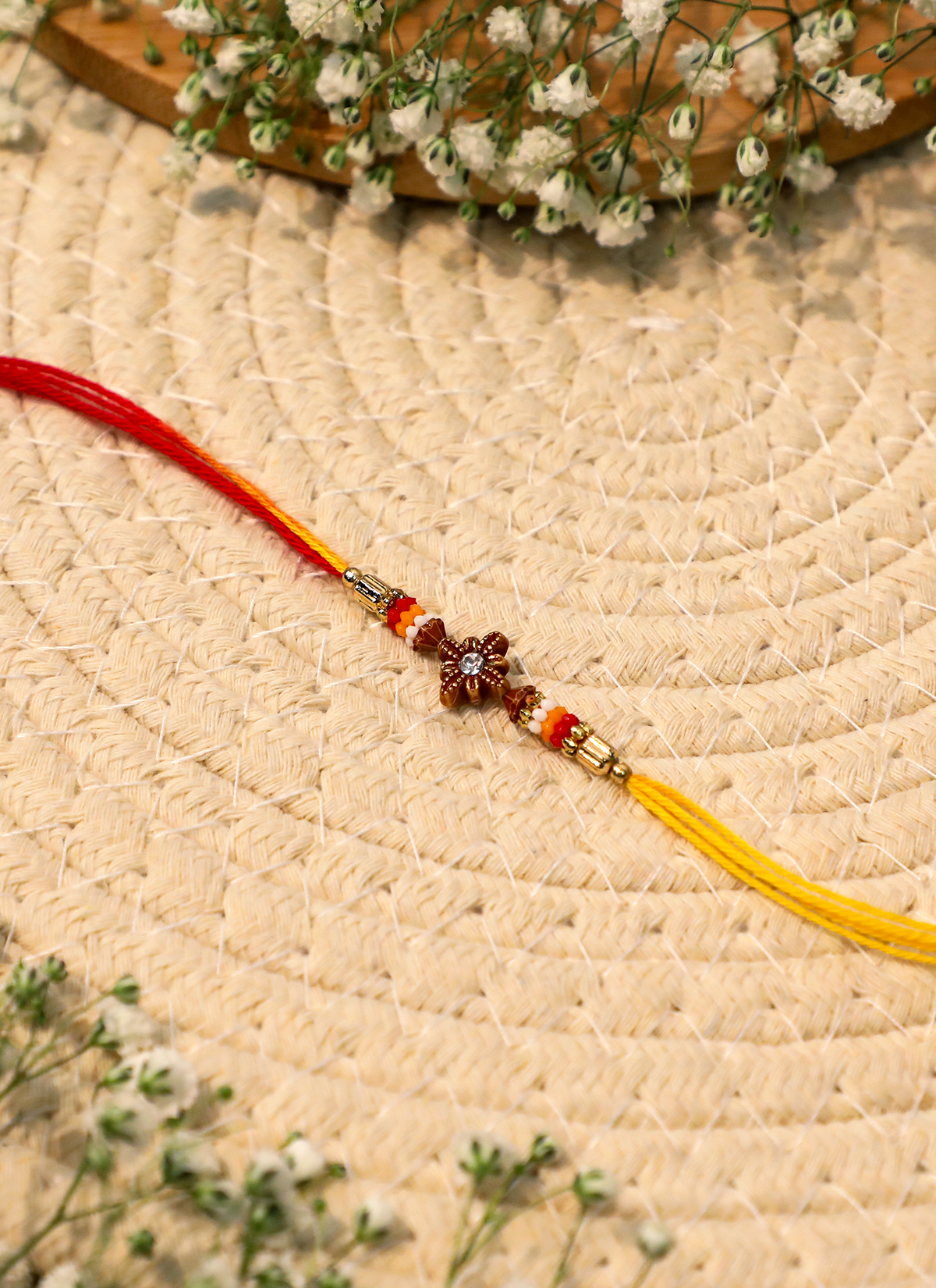 Madhoor Floral Rakhi Red Yellow 1 Piece
