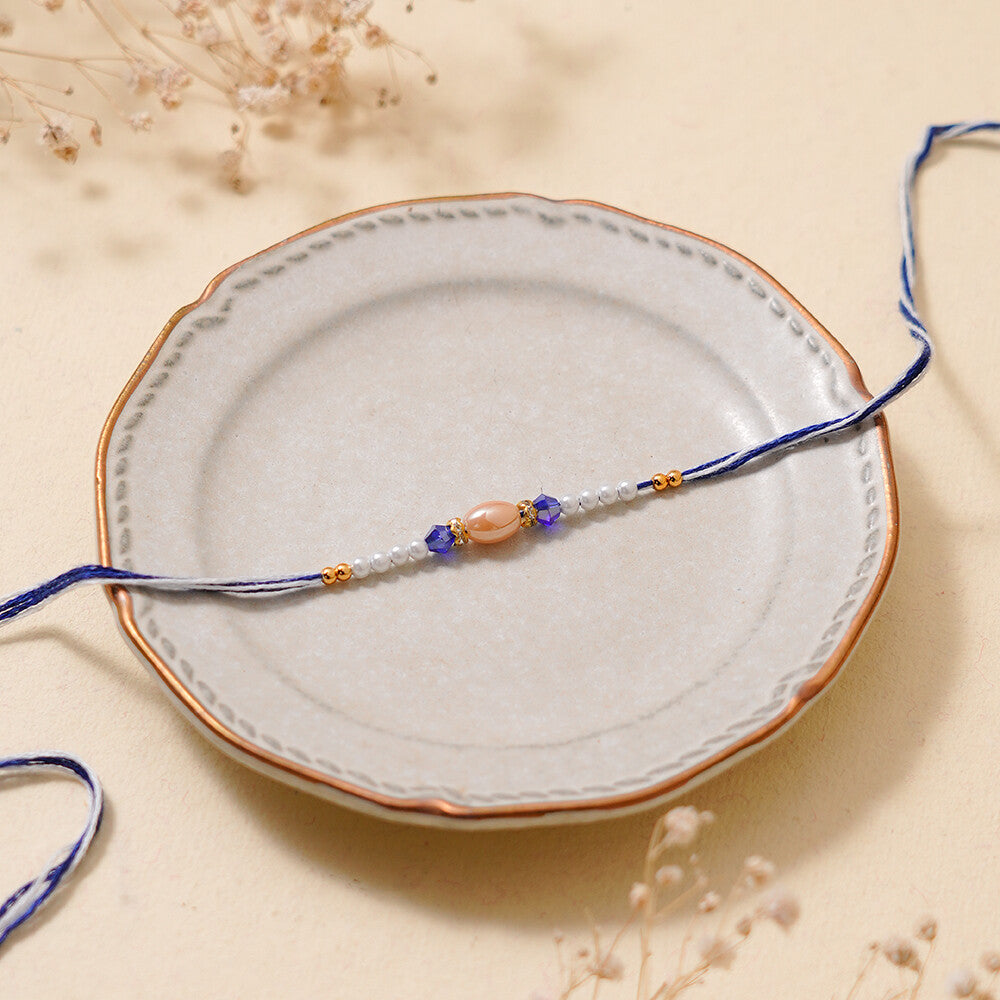 Madhoor Pearl Rakhi Blue 1 Piece