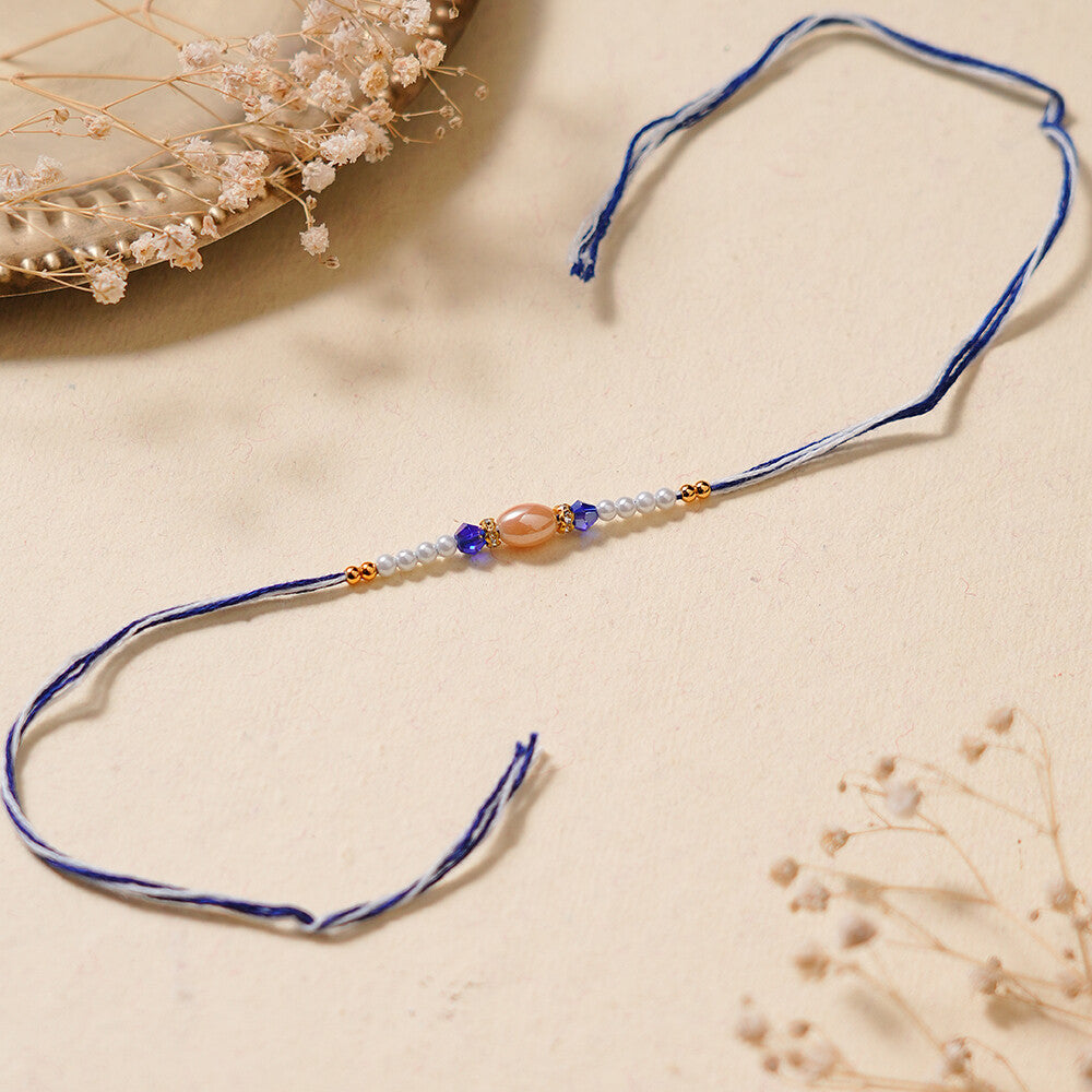 Madhoor Pearl Rakhi Blue 1 Piece