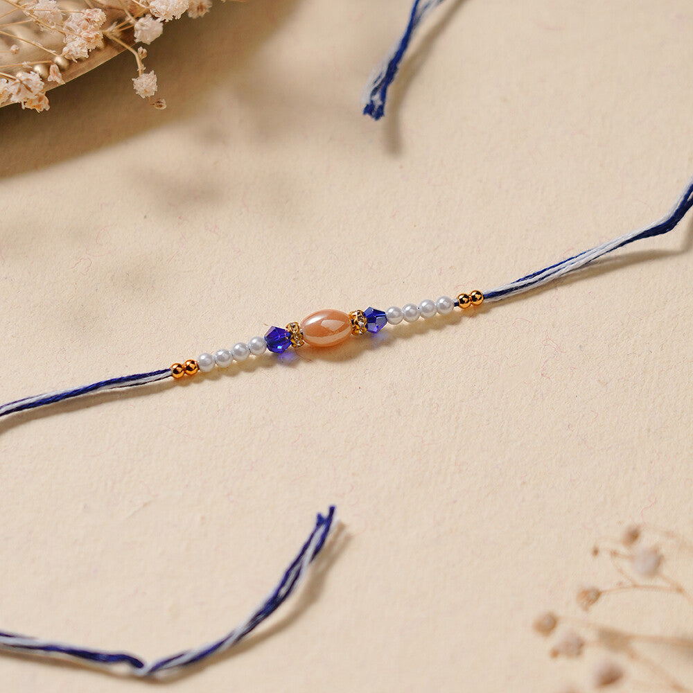 Madhoor Pearl Rakhi Blue 1 Piece