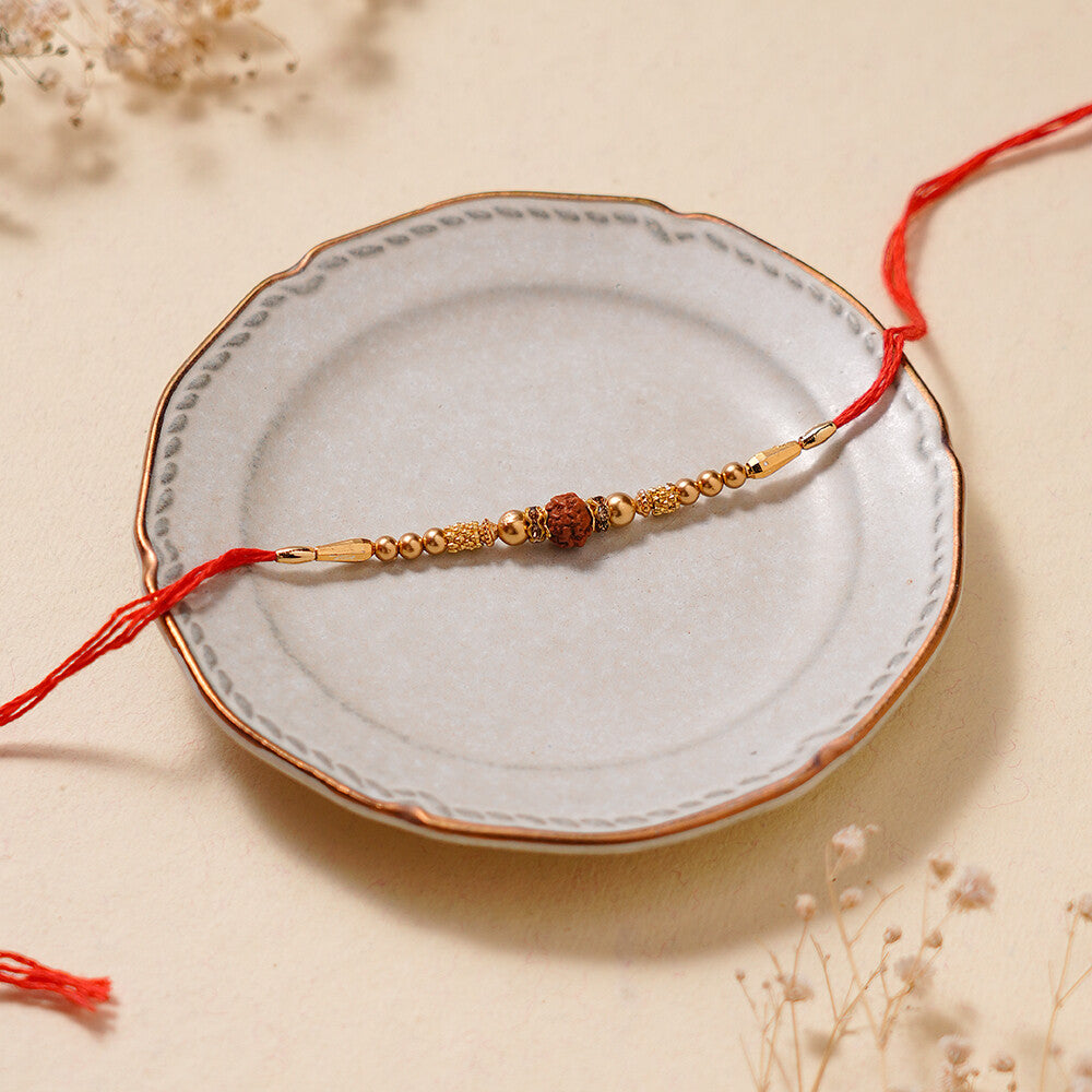 Madhoor Rudraksha Rakhi Gold-Tone Red Yellow 1 Piece