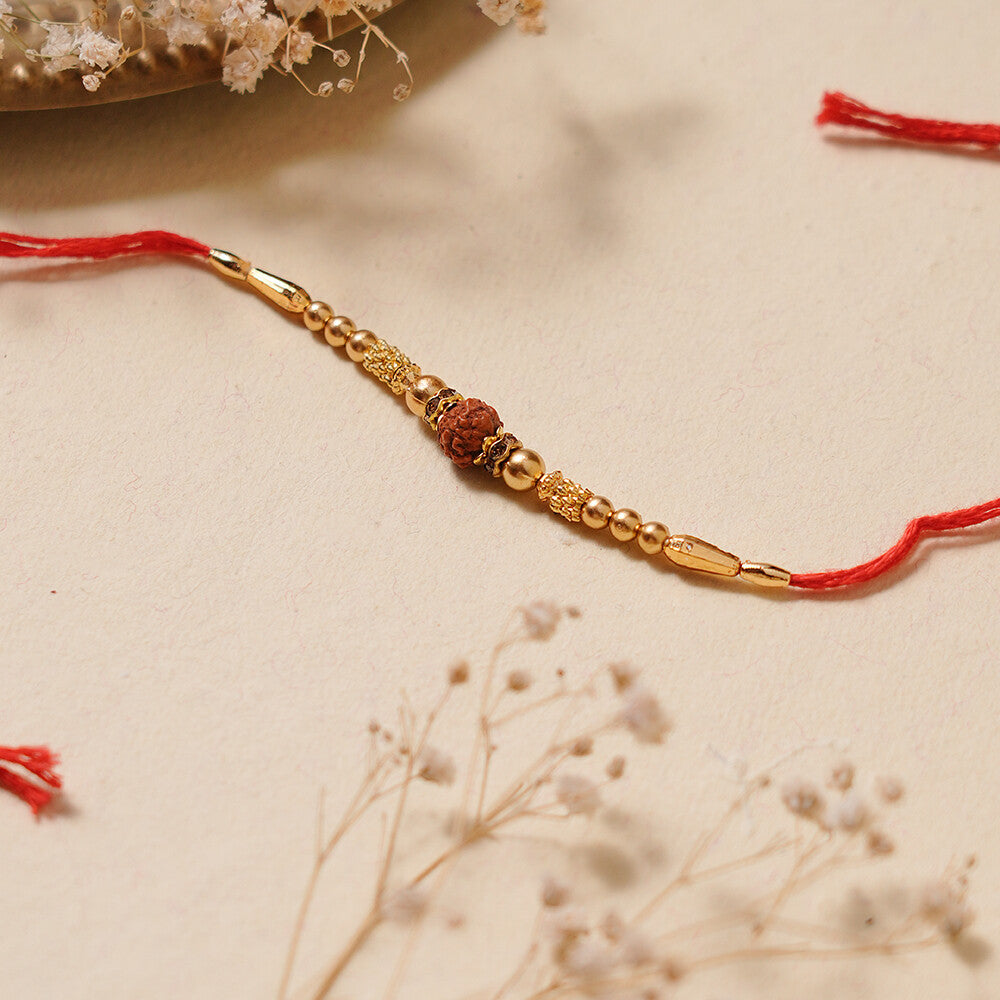 Madhoor Rudraksha Rakhi Gold-Tone Red Yellow 1 Piece