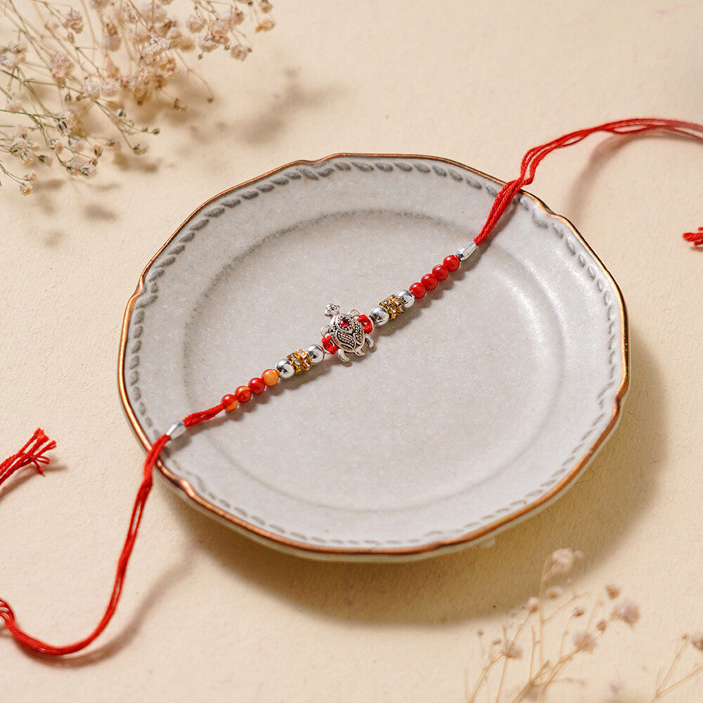 Madhoor Tortoise Rakhi Red 1 Piece