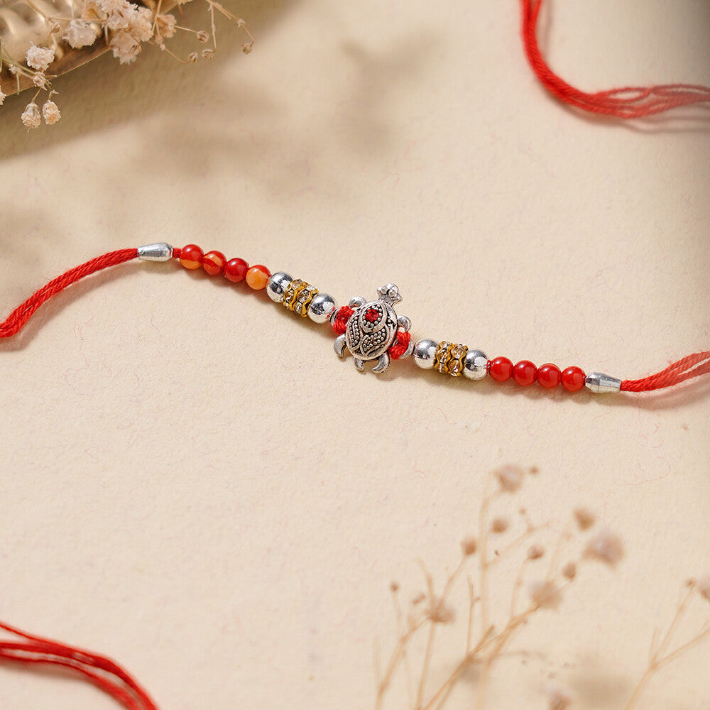 Madhoor Tortoise Rakhi Red 1 Piece