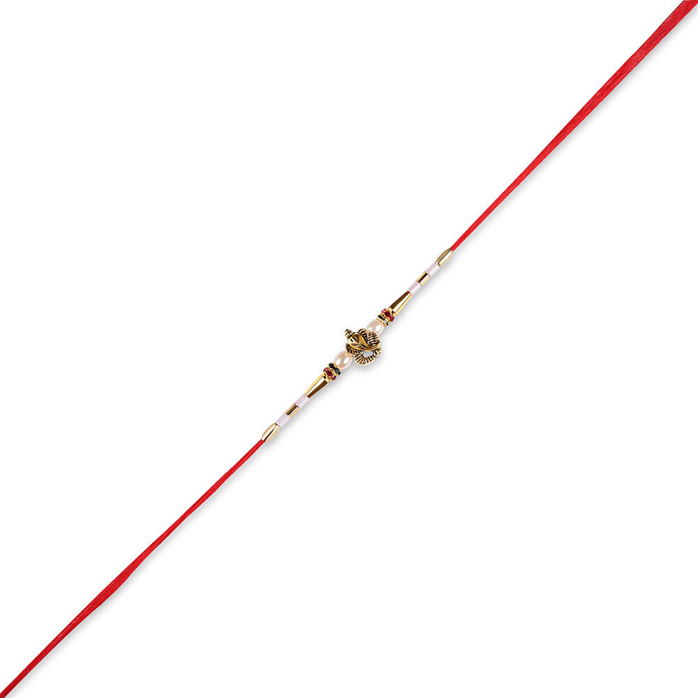 Madhoor Ganesha Pearl Rakhi Red 1 Piece