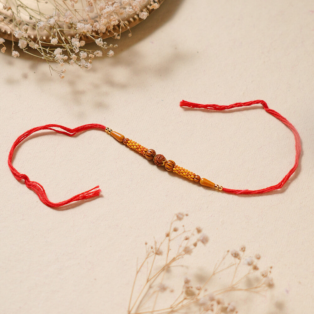 Madhoor Rudraksha Pearl Rakhi Red 1 Piece