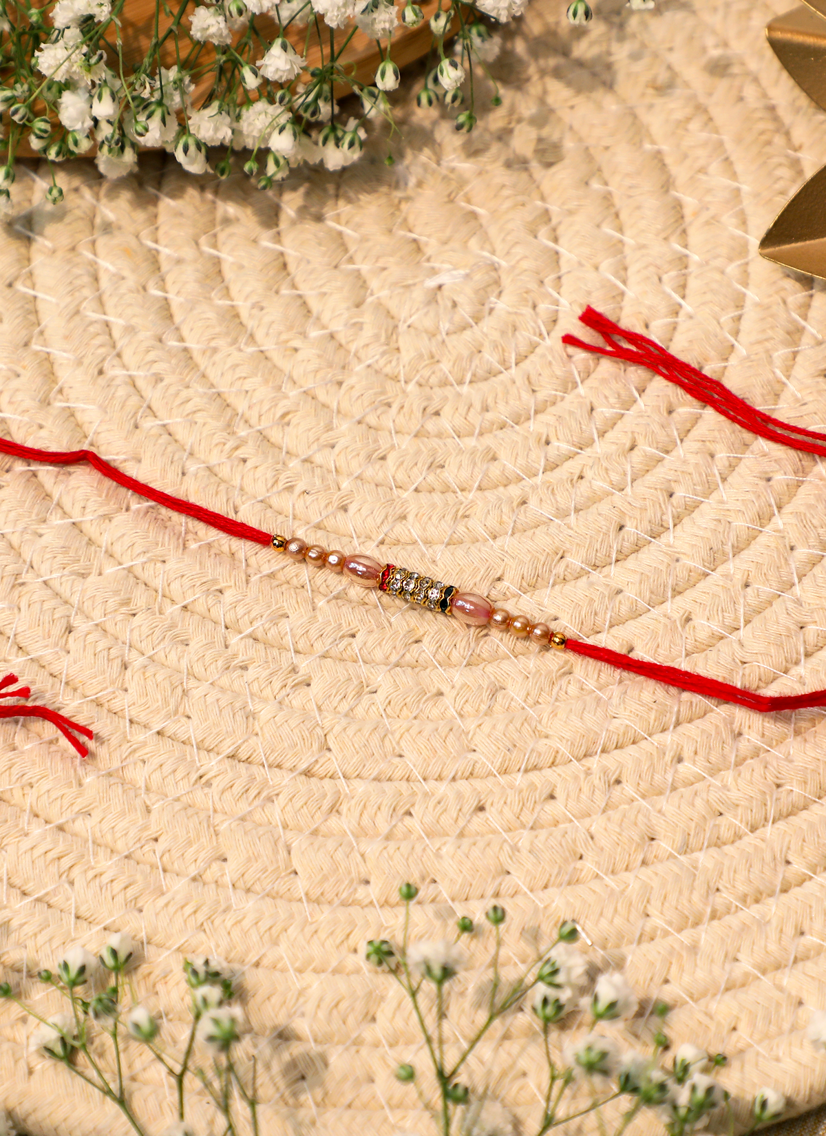 Madhoor Bead Rakhi Cream Red 1 Piece
