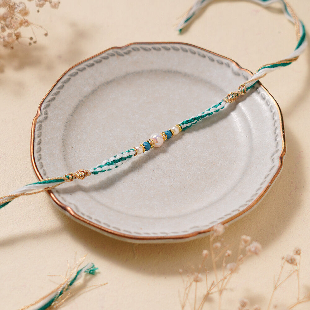 Madhoor Pearl Rakhi White Green 1 Piece