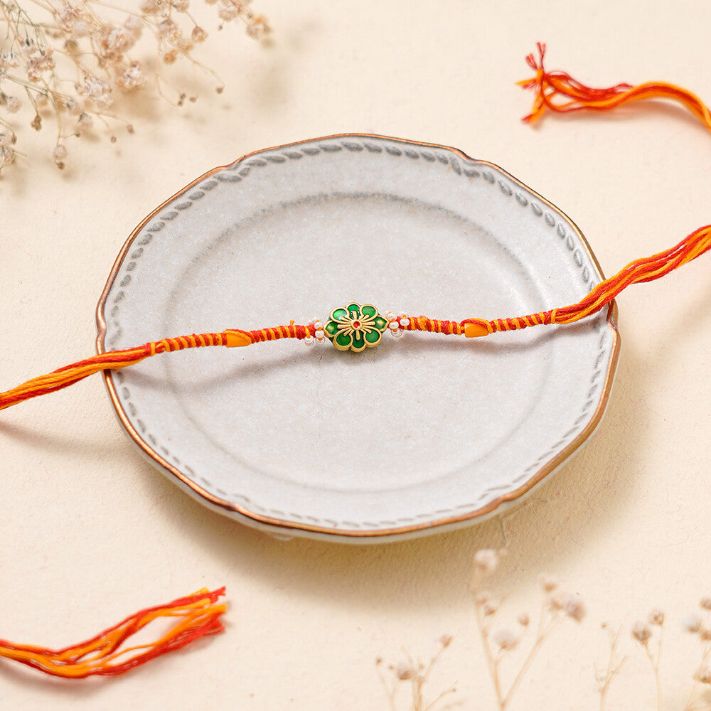 Madhoor Floral Twist Rakhi Red Yellow 1 Piece