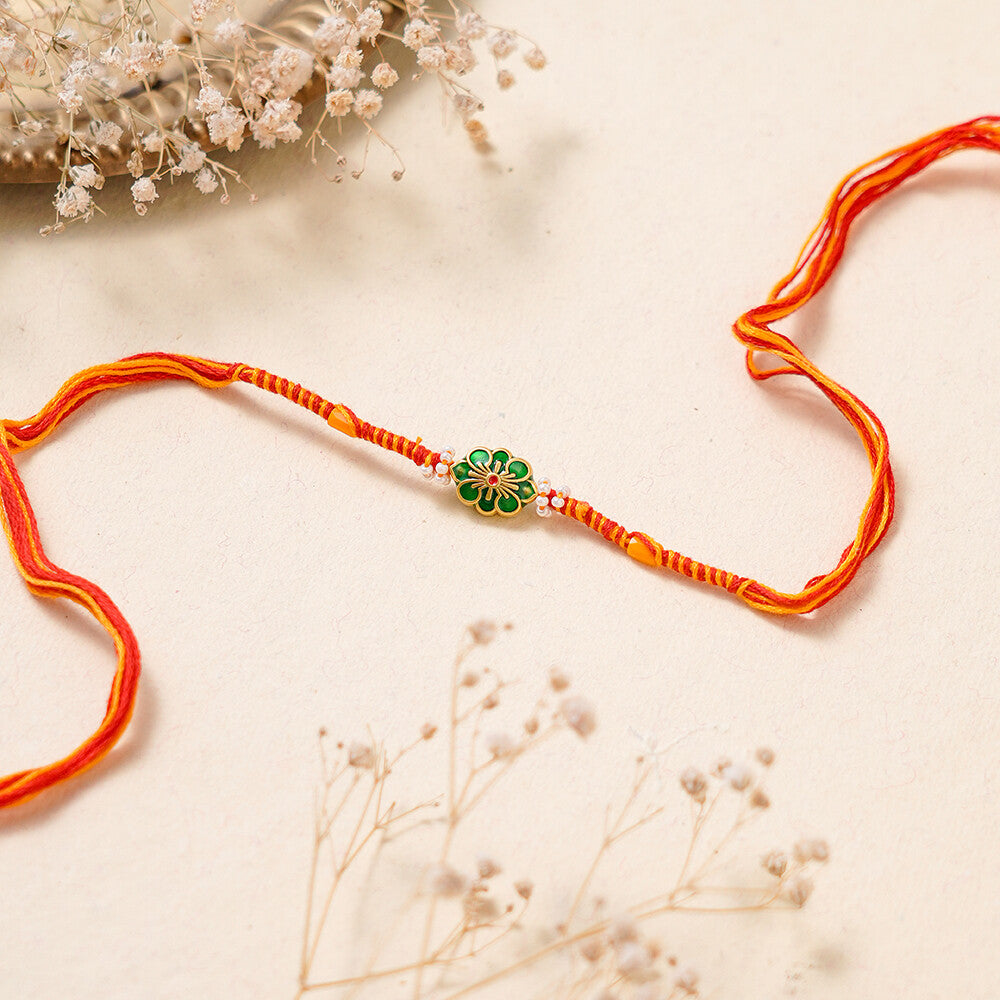 Madhoor Floral Twist Rakhi Red Yellow 1 Piece