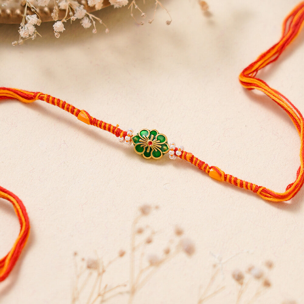 Madhoor Floral Twist Rakhi Red Yellow 1 Piece