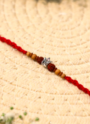 Madhoor Rudraksha Ganesha Rakhi Red 1 Piece