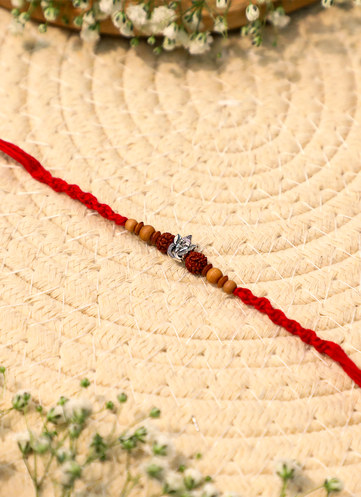 Madhoor Rudraksha Ganesha Rakhi Red 1 Piece