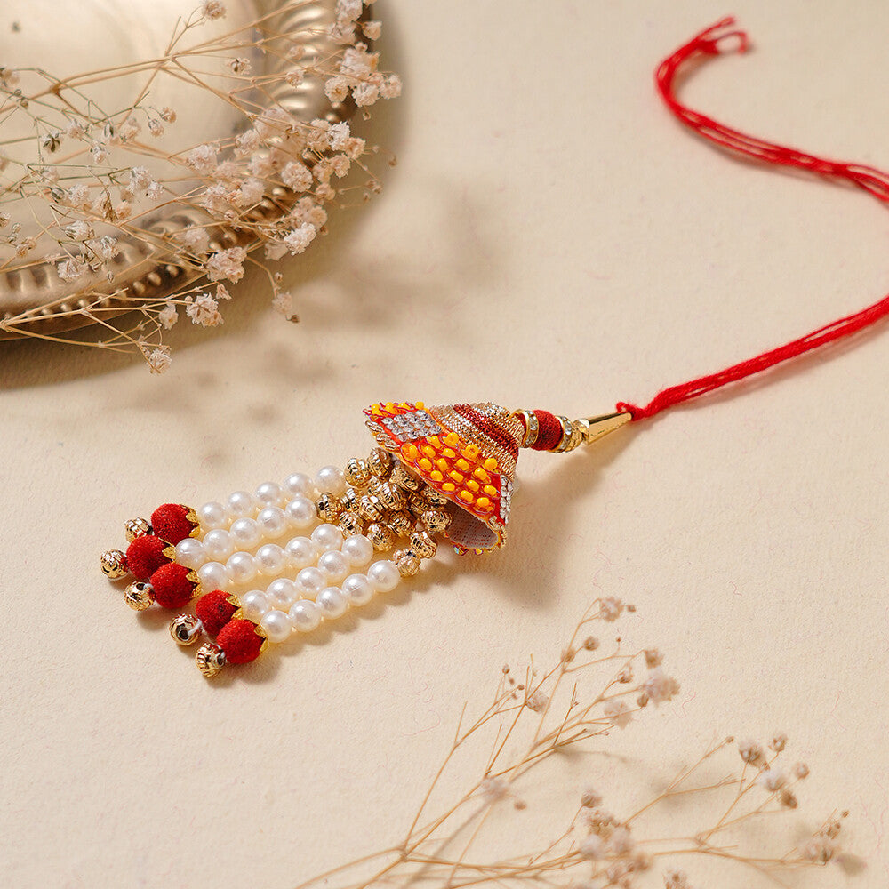 Madhoor Bead Jhumka Lumba Rakhi Peach 1 Piece